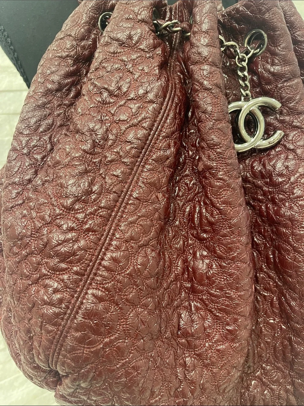 Authentic CHANEL Camelia in Bordeaux with CC Charm